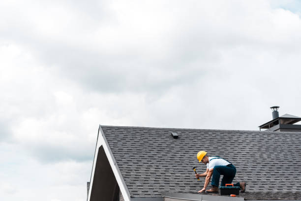 contractor fixing roofing a home